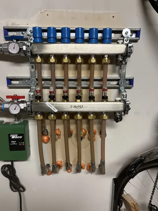 Plumber performing Gas Leak Detection at a residential property in Ashland